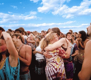 A herd of hippies grazes in a field near Burlington, VT.